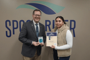 President Oldfield presents $100 Gift card to Esmeralda Uribe, the November Student Shout-Out recipient.