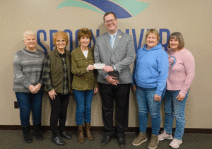 Members of the Spoon River Garden Club present $500 check to President Oldfield for Student Needs Center 