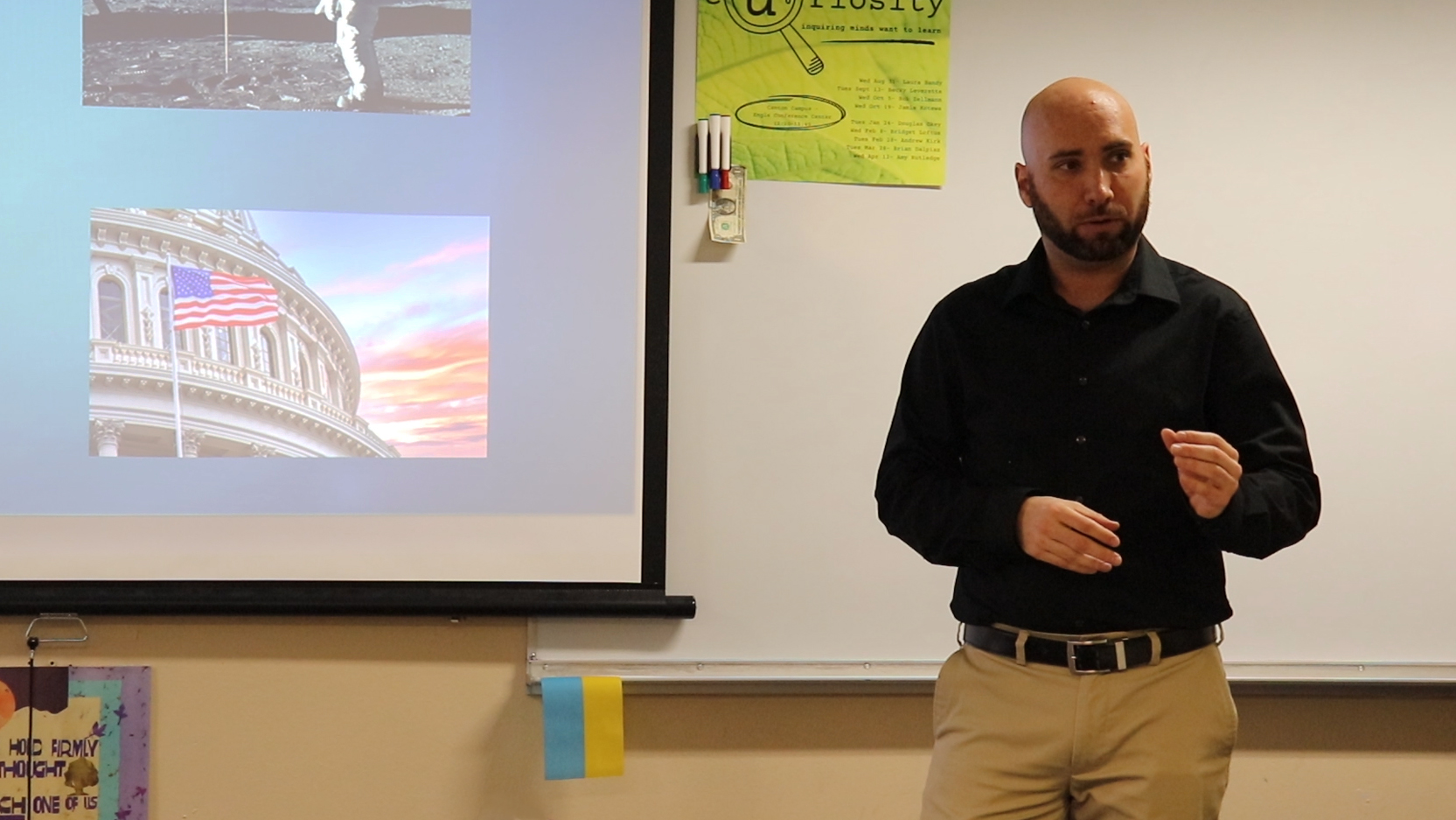 Joe Glenn, history teacher, presenting College Theme talk