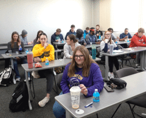 Students tasting different foods in Nutrition class taught by Elaine Lucas