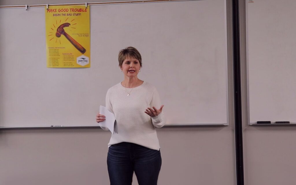 Melissa Miller giving College Theme Presentation