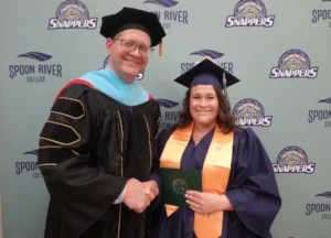 Image of Student Achievement recipient Alyssa Gilstrap pictured with President Oldfield at SRC Commencement