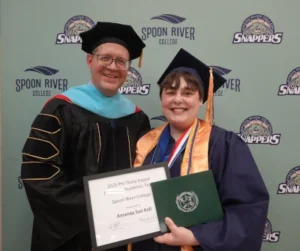 Image of Student Achievement winner Amanda Koll pictured with President Oldfield at SRC Commencement