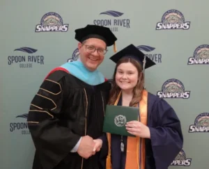 Pay It Forward Scholarship Recipient Alyssa Gilstrap with President Oldfield at SRC Commencement