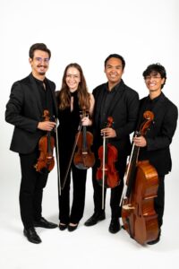 Portrait of WIU International String Quartet: Georgica Parvu, from Romania, on violin; Helena Iacob, from Romania, on violin; Gabriel Gene Regojos, from the Philippines, on viola; and Juan Marco Robledo Galvez, from Guatemala, on cello