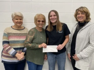 Image of scholarship recipient Danica Geeseman with members of the Spoon River Garden Club