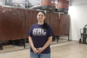 lmage of welding instructor Allysia Adams in the new Macomb campus welding lab.