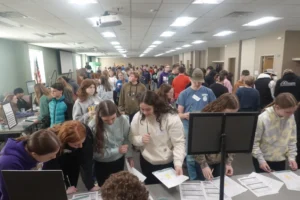 image of students at the 8th Grade Reality Store event at the Macomb Campus