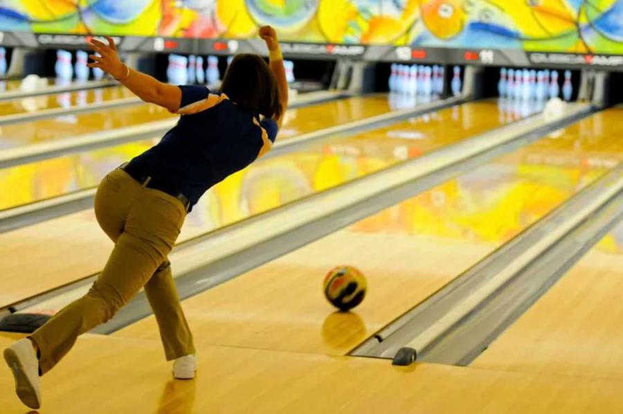 Image of a woman bowling.
